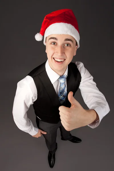 Ung man med santa hatt — Stockfoto