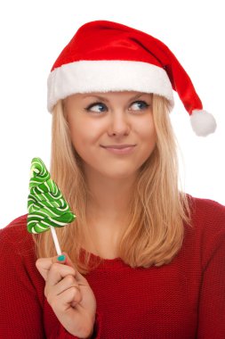 Genç sarışın kadın şeker ile Noel Baba şapkası