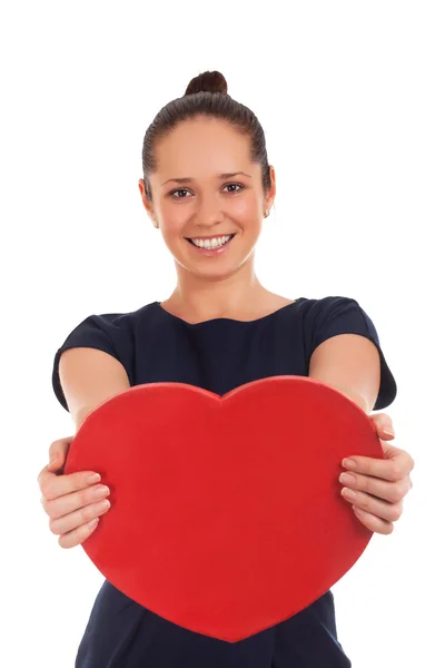 Woman holding Valentines Day heart sign Royalty Free Stock Images