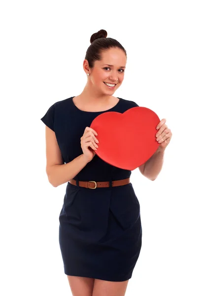 Woman holding Valentines Day heart sign Stock Photo