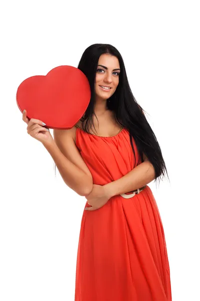 Woman holding Valentines Day heart sign Stock Photo