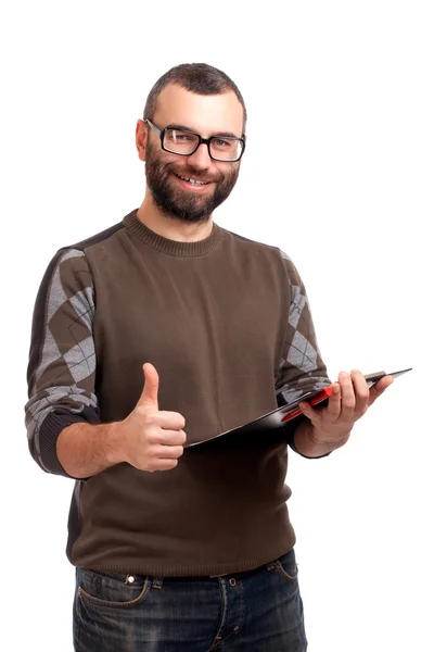 Joven con el portapapeles gestos pulgares hacia arriba — Foto de Stock