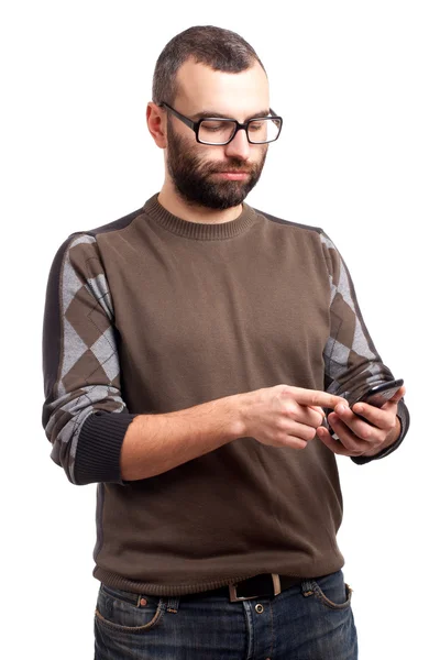 Jovem com barba segurando celular — Fotografia de Stock