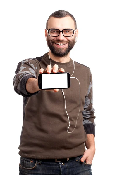 Jovem segurando um telefone celular — Fotografia de Stock