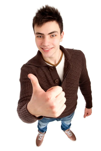 Young man showing thumbs up sign — Stock Photo, Image