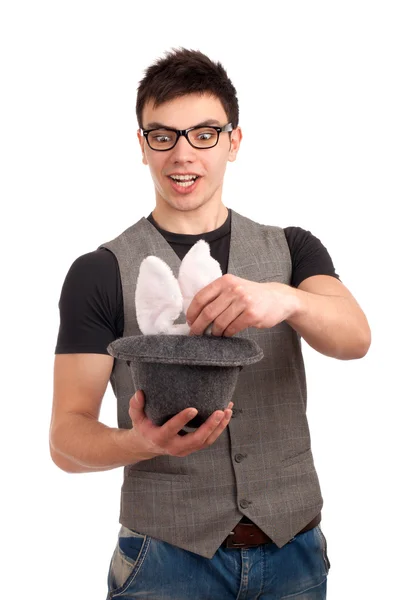 Retrato de um jovem fazendo magia — Fotografia de Stock