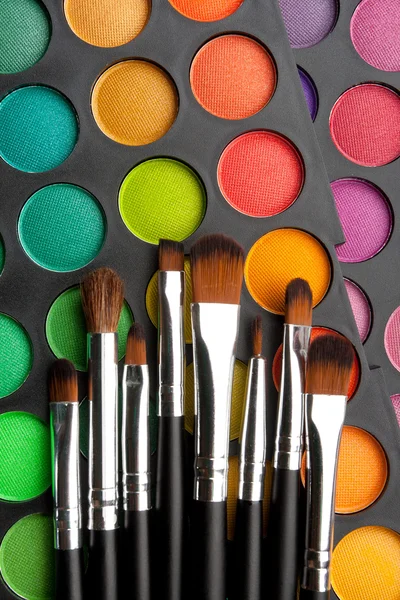 Makeup brushes and shadows — Stock Photo, Image