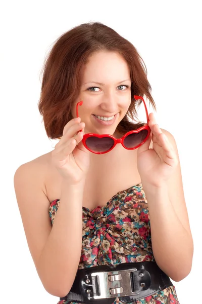 Jeune femme avec des lunettes en forme de coeur — Photo