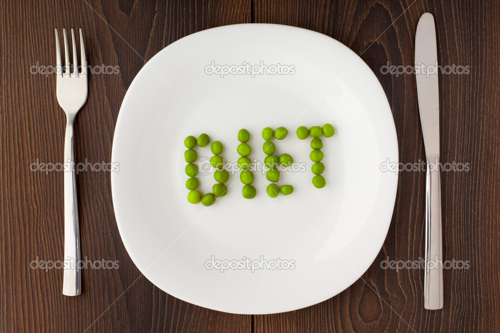 Word diet made of peas on a plate