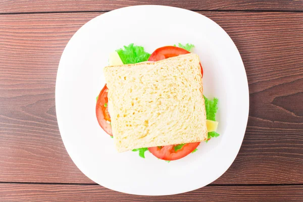 Sandwich mit Schinken, Käse und Tomaten — Stockfoto