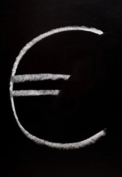 Symbol měny euro na tabuli — Stock fotografie