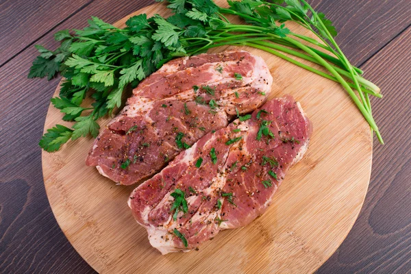 Raw steak with spices — Stock Photo, Image