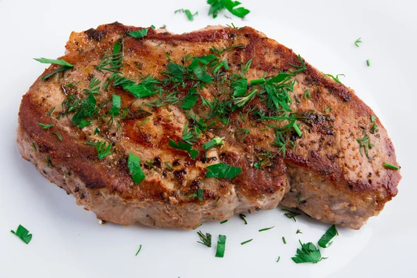 Gegrilltes Steak auf weißem Teller — Stockfoto