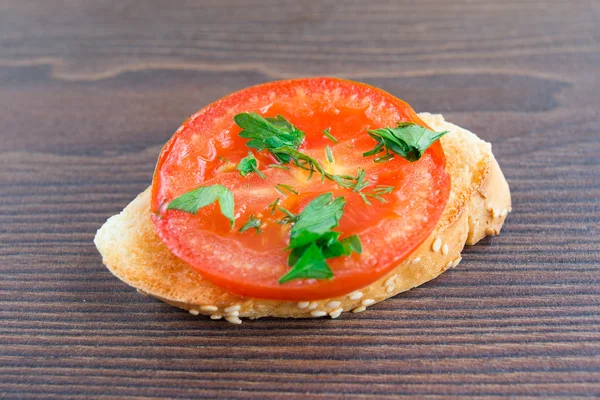 Delicious tomato bruschetta with herbs — Stock Photo, Image