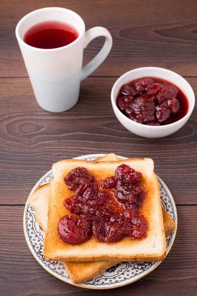 Toast with strawberry jam — Stock Photo, Image