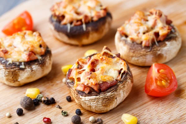 Stuffed champignons with ham and cheese — Stock Photo, Image
