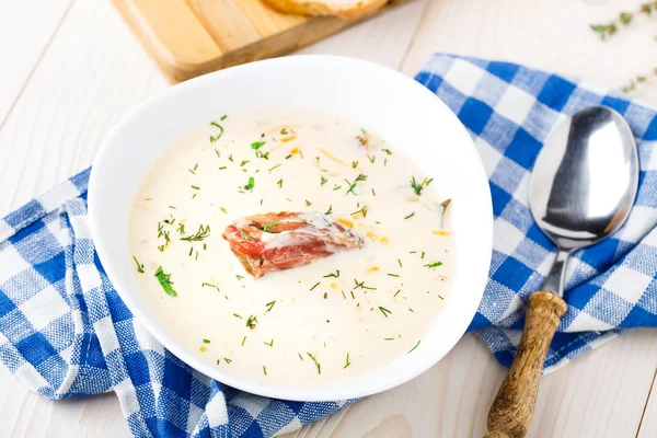 Cheese soup with smoked ribs — Stock Photo, Image