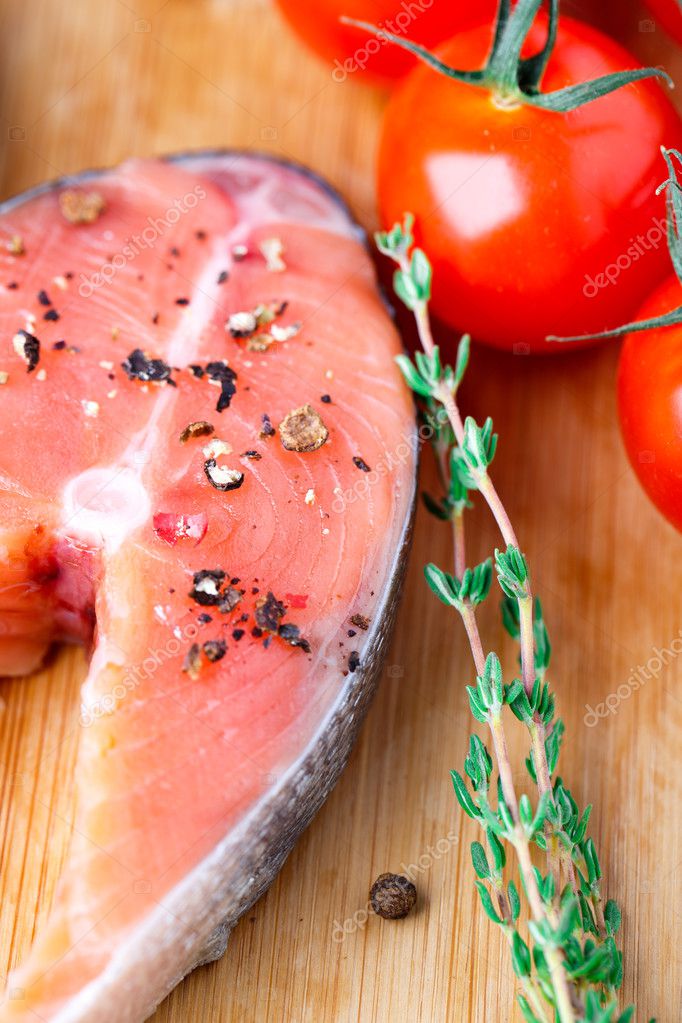 Salmon steak with thyme and pepper Stock Photo by ©vankad 33670819