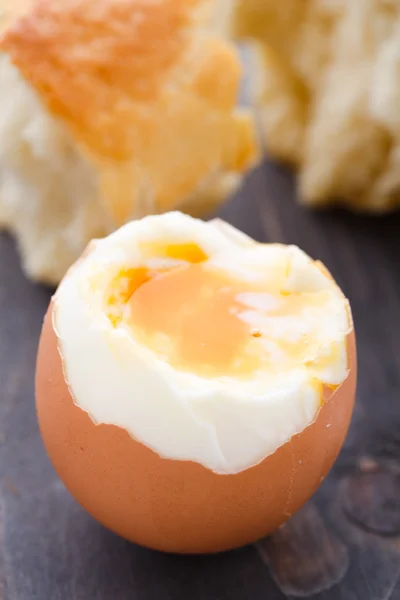 Soft egg with fresh baguette — Stock Photo, Image