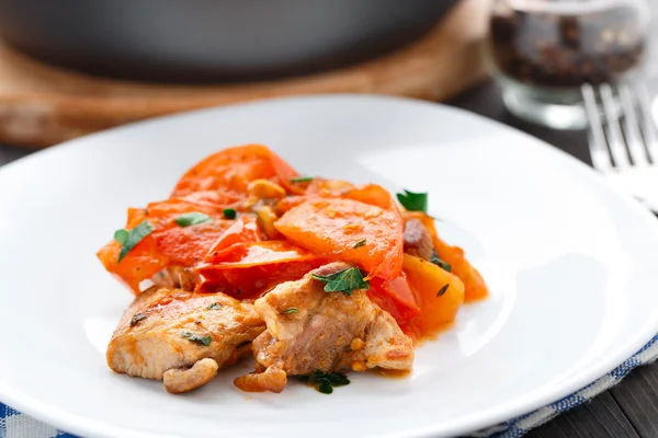 Fried pork with pan-roasted tomatoes — Stock Photo, Image