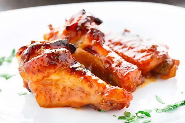 Chicken wings with honey sauce — Stock Photo, Image