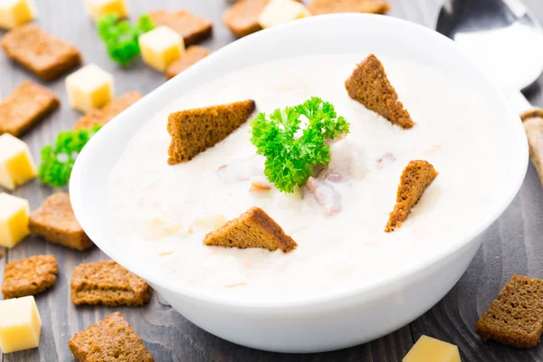Cheese soup with toasts — Stock Photo, Image