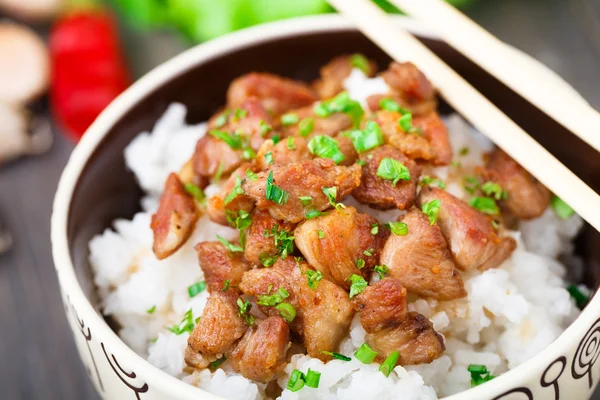 Bowl of rice with meat — Stock Photo, Image