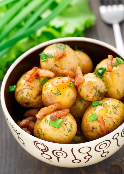 Potato with bacon and herbs — Stock Photo, Image