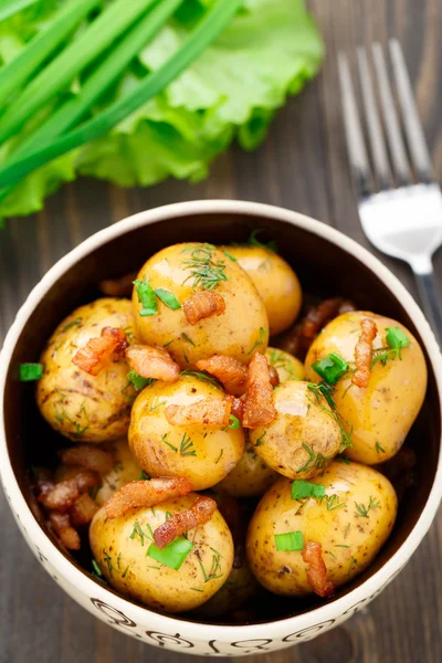 Potato with bacon and herbs — Stock Photo, Image