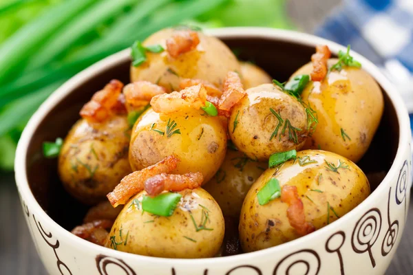 Potato with bacon and herbs — Stock Photo, Image