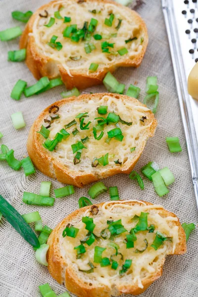 Bruschetta with cheese and scallion — Stock Photo, Image