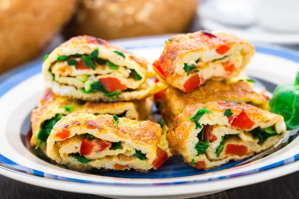 Omelet with vegetables and herbs — Stock Photo, Image