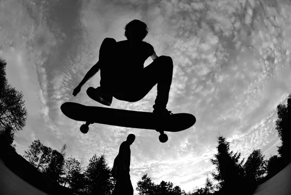 Silhouette skateboard Foto Stock
