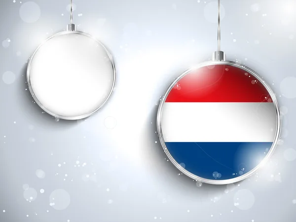 Frohe Weihnachten silberne Kugel mit Flagge Niederlande — Stockvektor