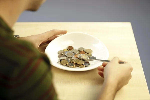 Jedzenie kilka monet — Zdjęcie stockowe