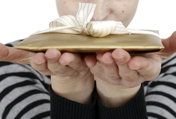 Young woman holding a present — Stock Photo, Image