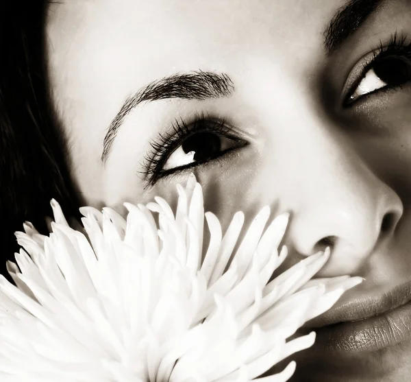 Girl with a white flower — Stock Photo, Image