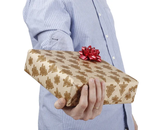 Young man holding a present Stock Picture