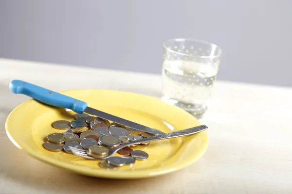 Euro coins in a plate — Stock Photo, Image