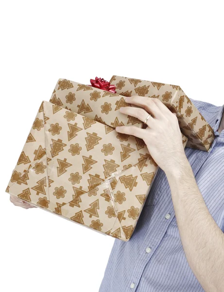 Young man holding a present — Stockfoto