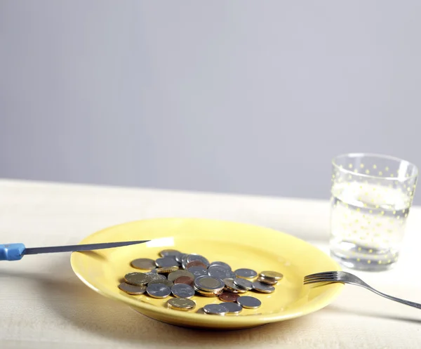 Euro coins in a plate — Stock Photo, Image