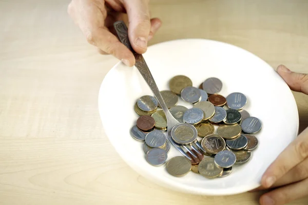 Eating some coins — Stock Photo, Image