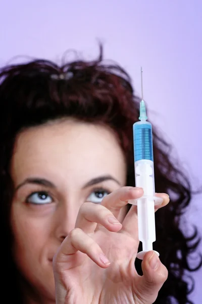 Portrait of a young doctor with syringa. — Stock Photo, Image