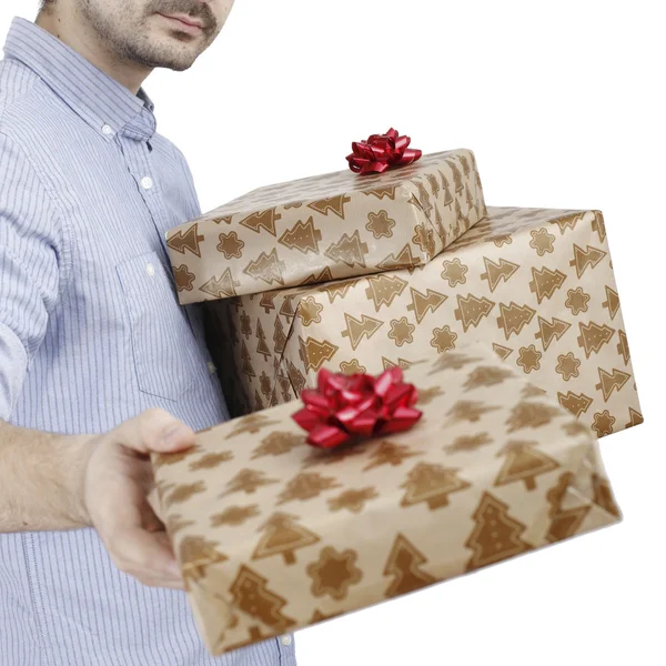 Young man holding a present — Stok fotoğraf