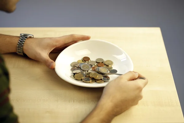 Jedzenie kilka monet — Zdjęcie stockowe