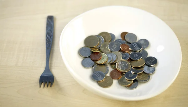 Eating some coins — Stock Photo, Image