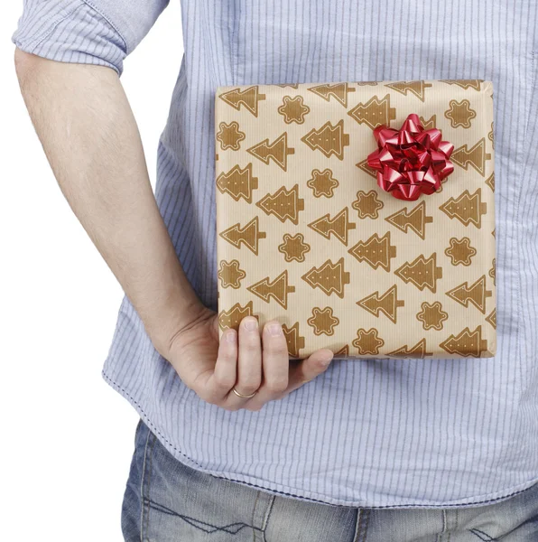 Young man holding a present Royalty Free Stock Images