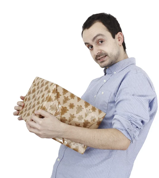 Junger Mann mit einem Geschenk — Stockfoto