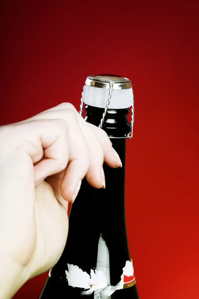 Opening champagne bottle — Stock Photo, Image