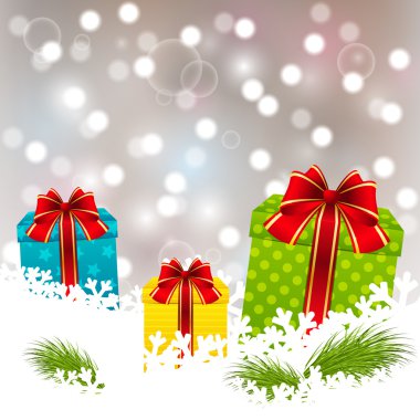 Beyaz kar üzerinde Noel hediyeleri